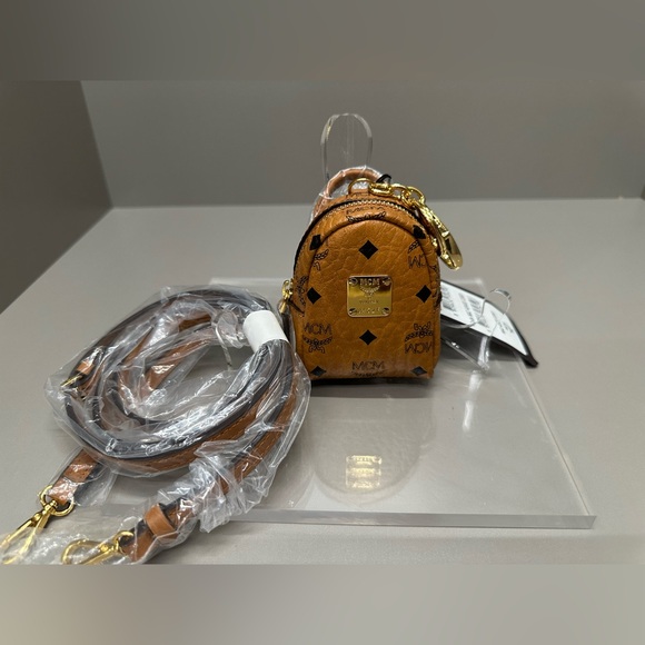 MCM MICRO BACKPACK WITH CROSSBODY STRAP. Can also be used as a bag charm. NWT - Picture 8 of 10